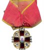 Знак ордена Святой Анны 1−2-й степеней. Мастерская А. Панова (?). Начало XIX. Золото, эмаль, стразы, цветное стекло.